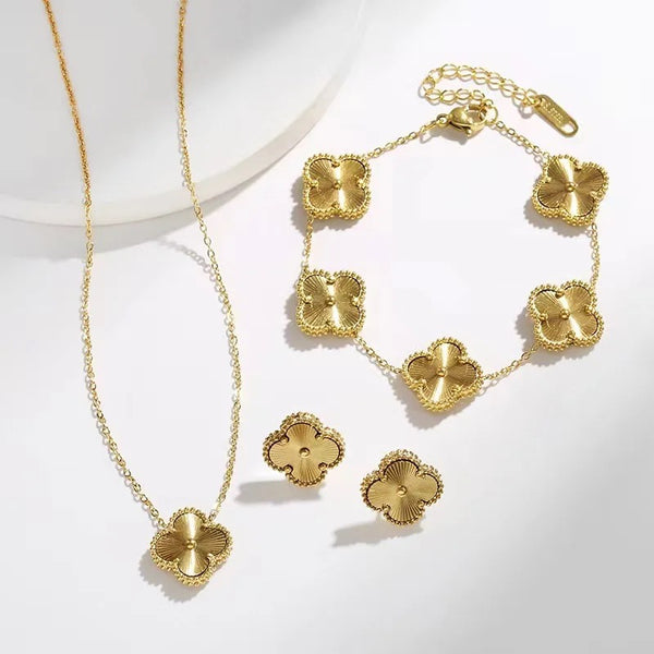 gold plated four leaf clover necklace, bracelet and earrings